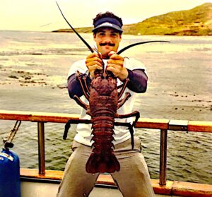 Bob Bekian with a 12lb. lobster he caught and released at St. Nicholas Island Califonia