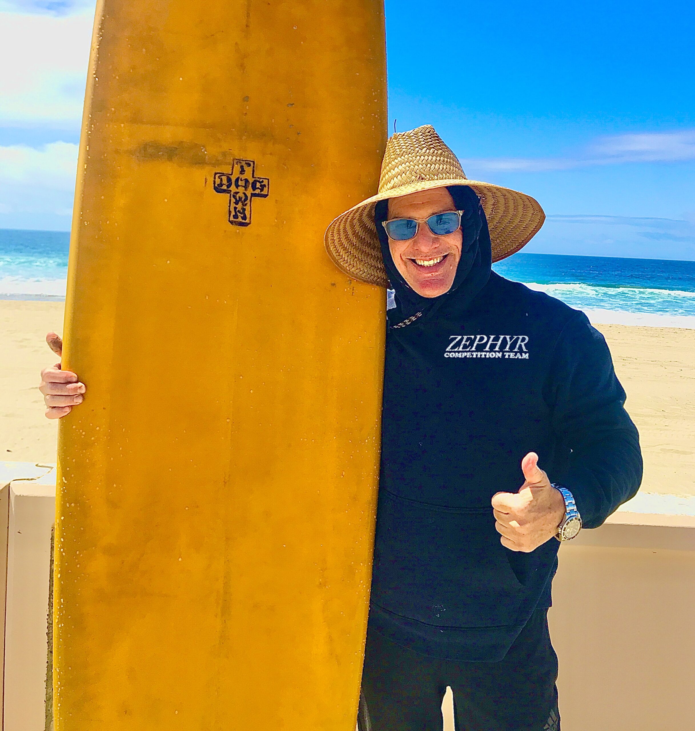 Bob Bekian at Malibu Beach with a vintage Dogtown surfboard