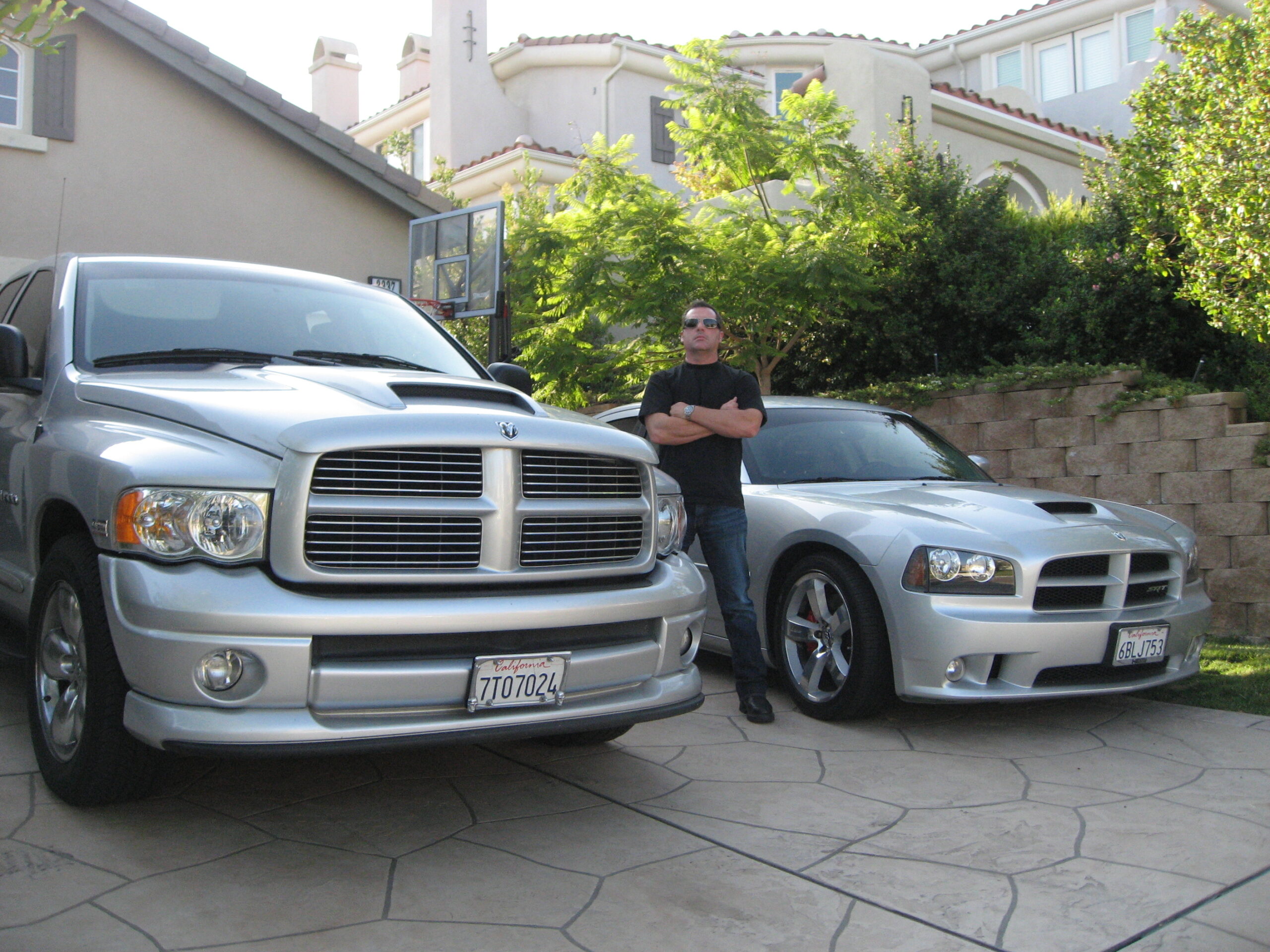 Bob Bekian with two of his Hemi-Powered cars